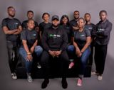 The ShipAfrica team, led by founder Walter Isoko, posing together in matching branded black apparel.