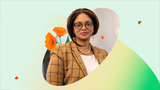 Portrait of Morounke Olufemi, Global Chief Financial Officer of Flutterwave, wearing glasses, a patterned blazer, and a pearl necklace against a light background framed by abstract shapes.