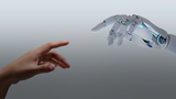 A human hand and a robotic hand reaching toward each other against a neutral grey gradient background, evoking the creation of Adam imagery.