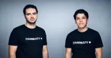 Co-founders Amr Mouaqit and Driss Sijelmassi wearing black matching "CHARIKATY" t-shirts against a light grey background.
