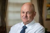 Portrait of Sanlam Group CEO Paul Hanratty wearing a patterned tie and white dress shirt.
