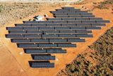 Aerial drone view of a 1.08MWp ground-mounted solar panel installation at Genade Boerdery in the Northern Cape, South Africa. 
