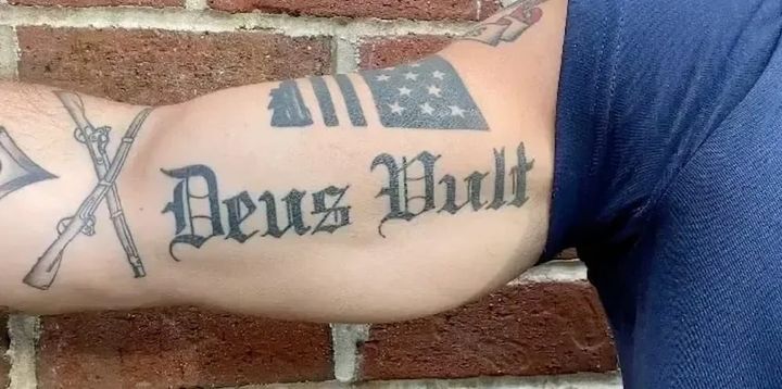 Photo of a Deus Volt tattoo among others on Pete Hegseth's arm