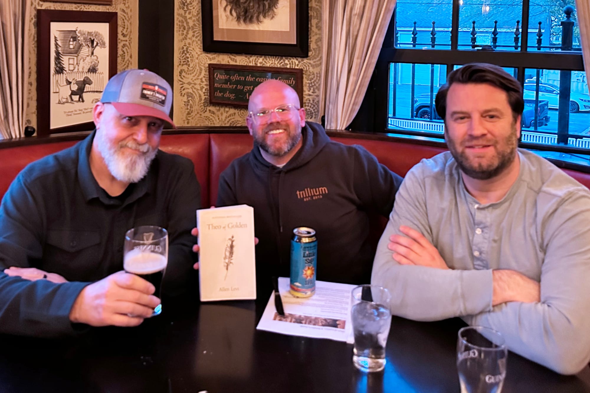 Three members of The Wild Gentleman Book Club reading Theo of Golden