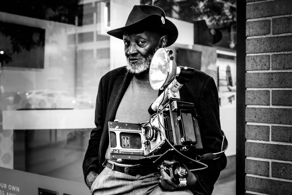 street corner photographer large format camera speed graphic manhattan black and white fine art photo