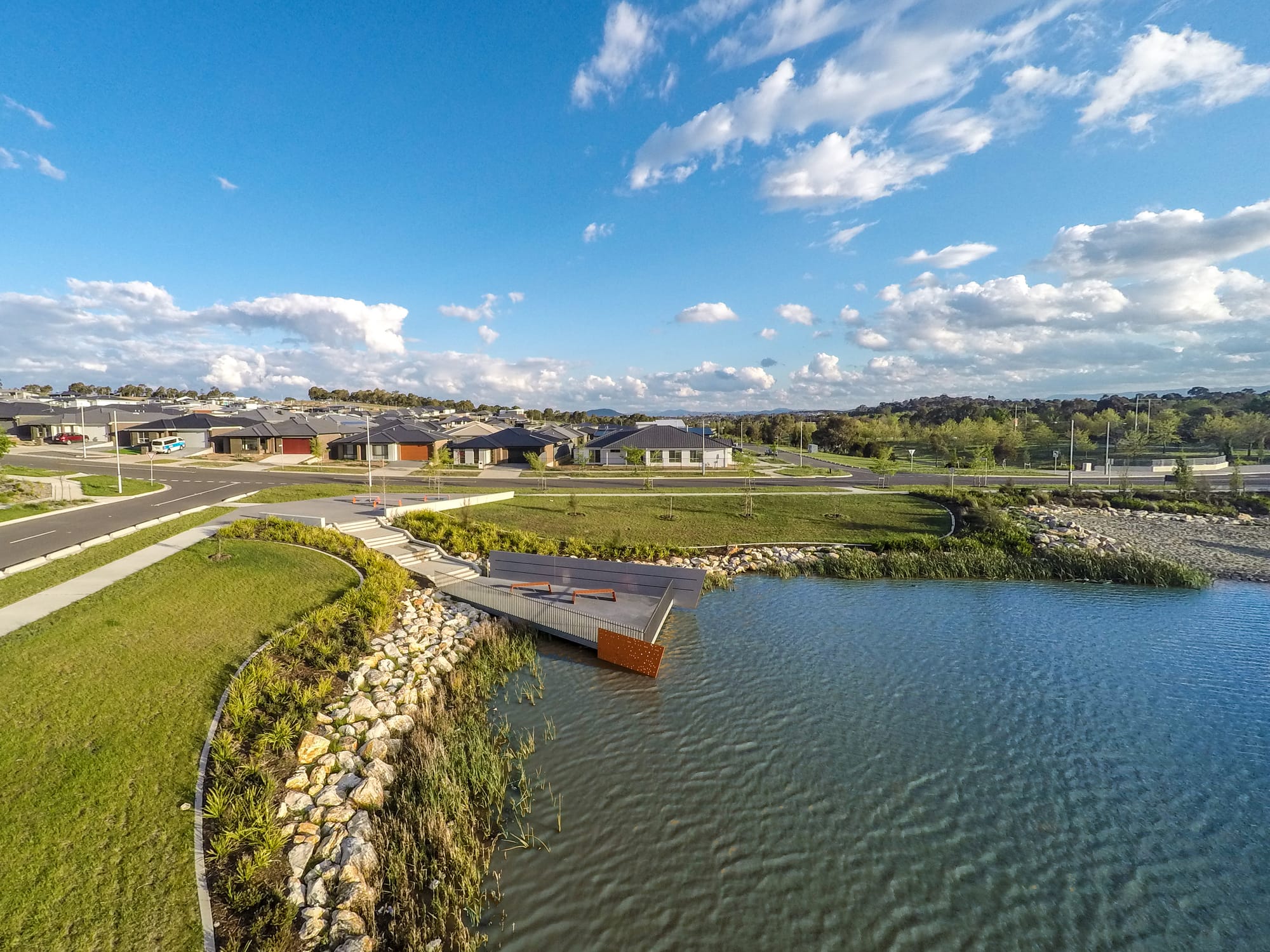 Aerial view of a viewing platform and paths beside the Moncrieff East pond.