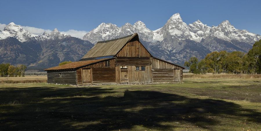 The 1913 Moulton Barn on Mormon Row with the Teton Range behind it, Grand Teton National Park