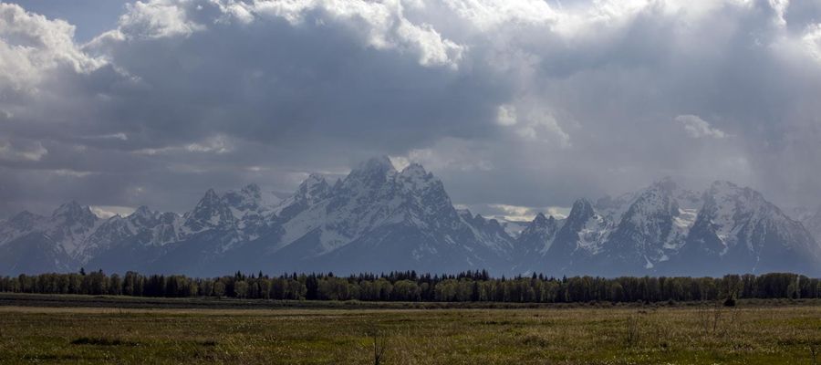 Rain and low cloud over the Teton Range above the sagebrush flats of Jackson Hole