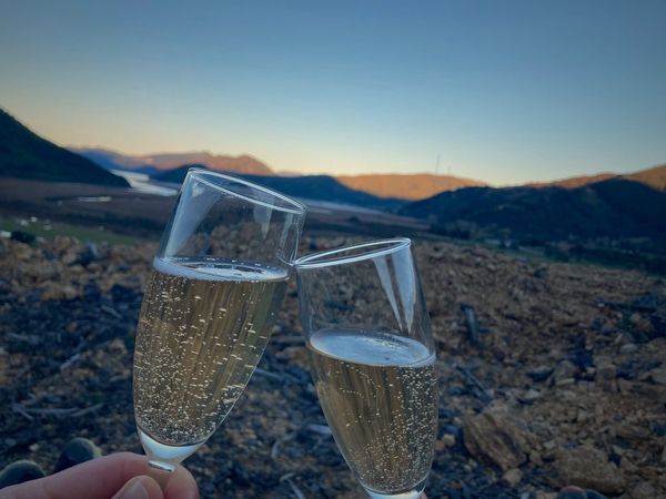 2 glasses of champage with a stunning view in the background