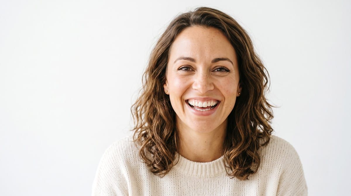 woman smiling confidently showing small gap between front teeth