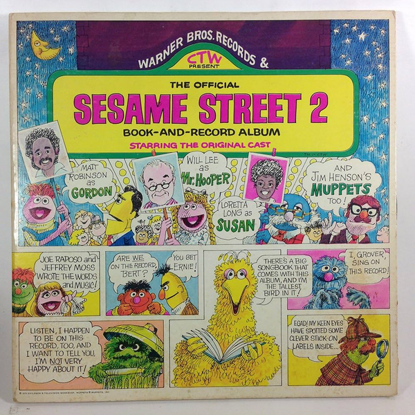 Album cover for 'The Official Sesame Street 2 Book-and-Record Album,' featuring Big Bird, Oscar the Grouch, Grover, and Muppet character illustrations with speech bubbles.