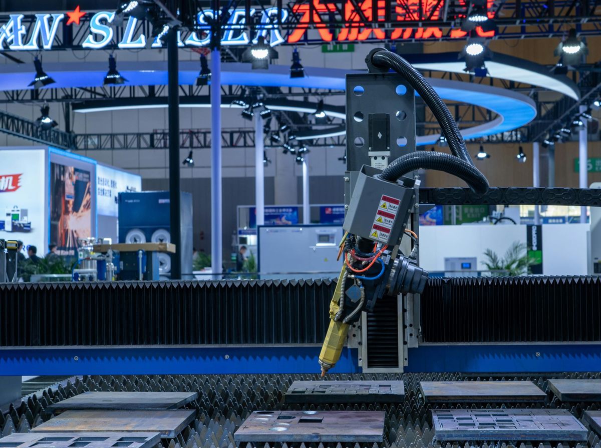 High-Tech CNC Laser Machine in Industrial Setting. Photo: Peter Xie