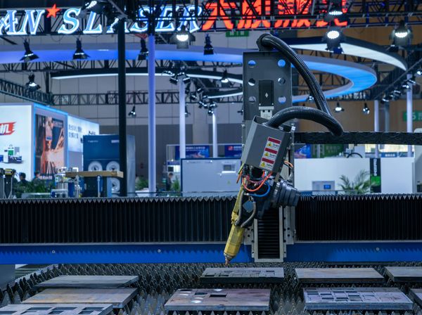 High-Tech CNC Laser Machine in Industrial Setting. Photo: Peter Xie