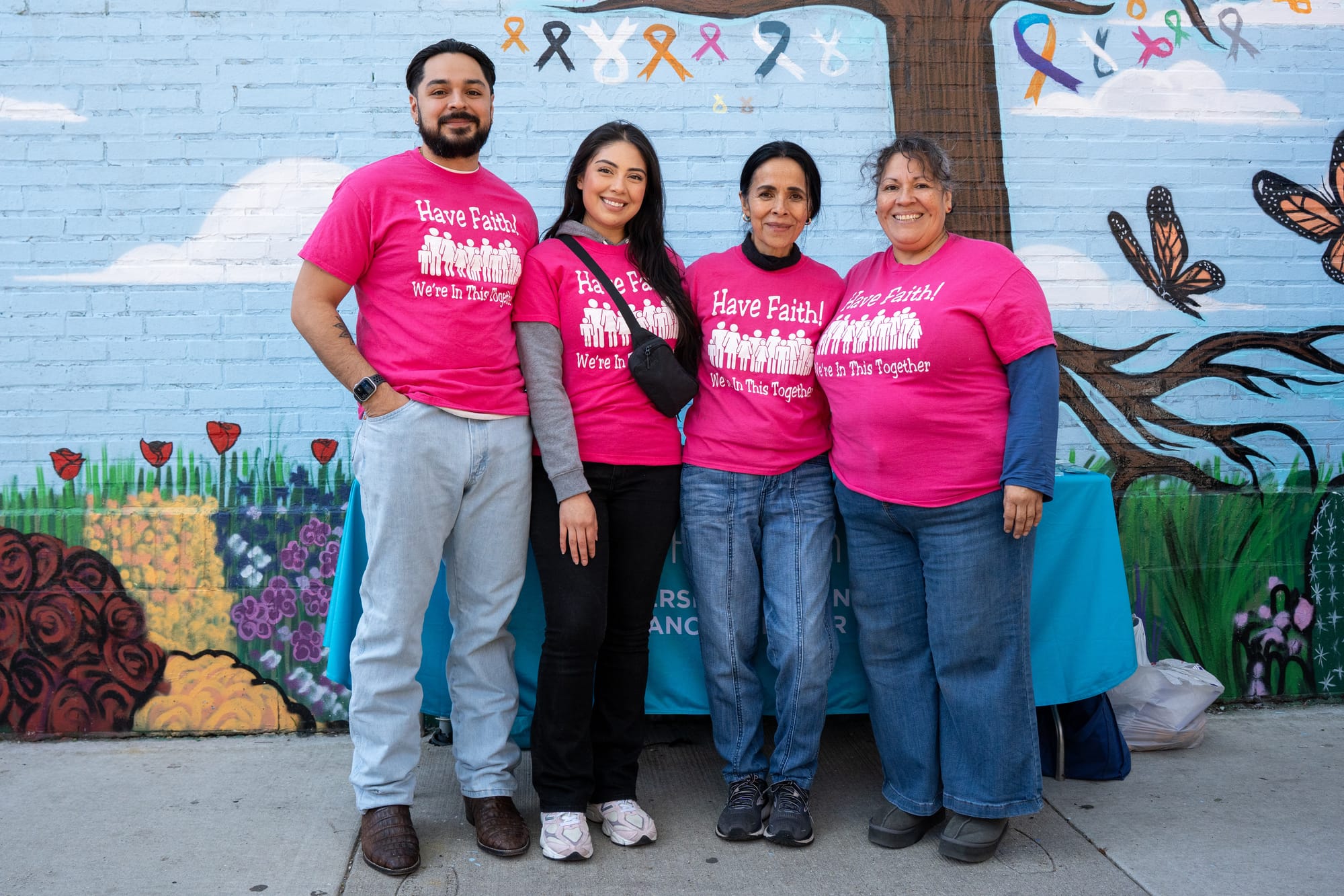 Dolores Castañeda and others pose for a photo during the mural unveiling event on April 18, 2026, in Little Village. | Araceli Ramirez/15 West