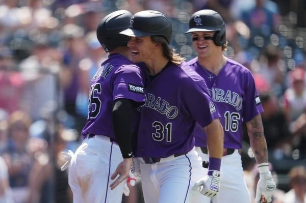 Jake McCarthy celebrates with teammates.