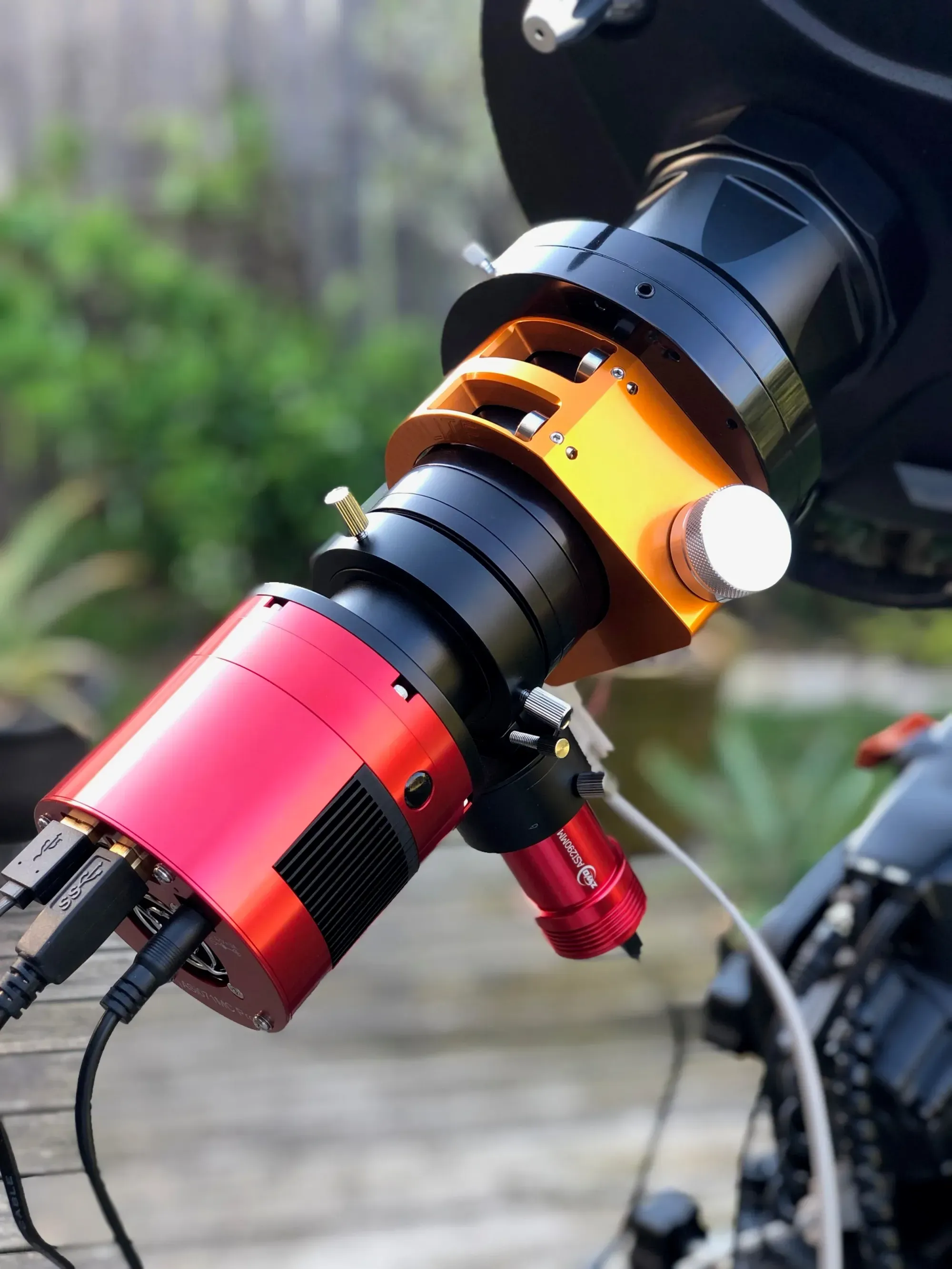  A close up of the imaging train. Starting at the EdgeHD 11”, there’s the Celestron .7x Edge reducer, the Moonlite focuser, a spacer ring, an Astronomic L-2 UV/IR cut filter, the OAG with 290mm, another spacer, and then the 071mc color camera. 