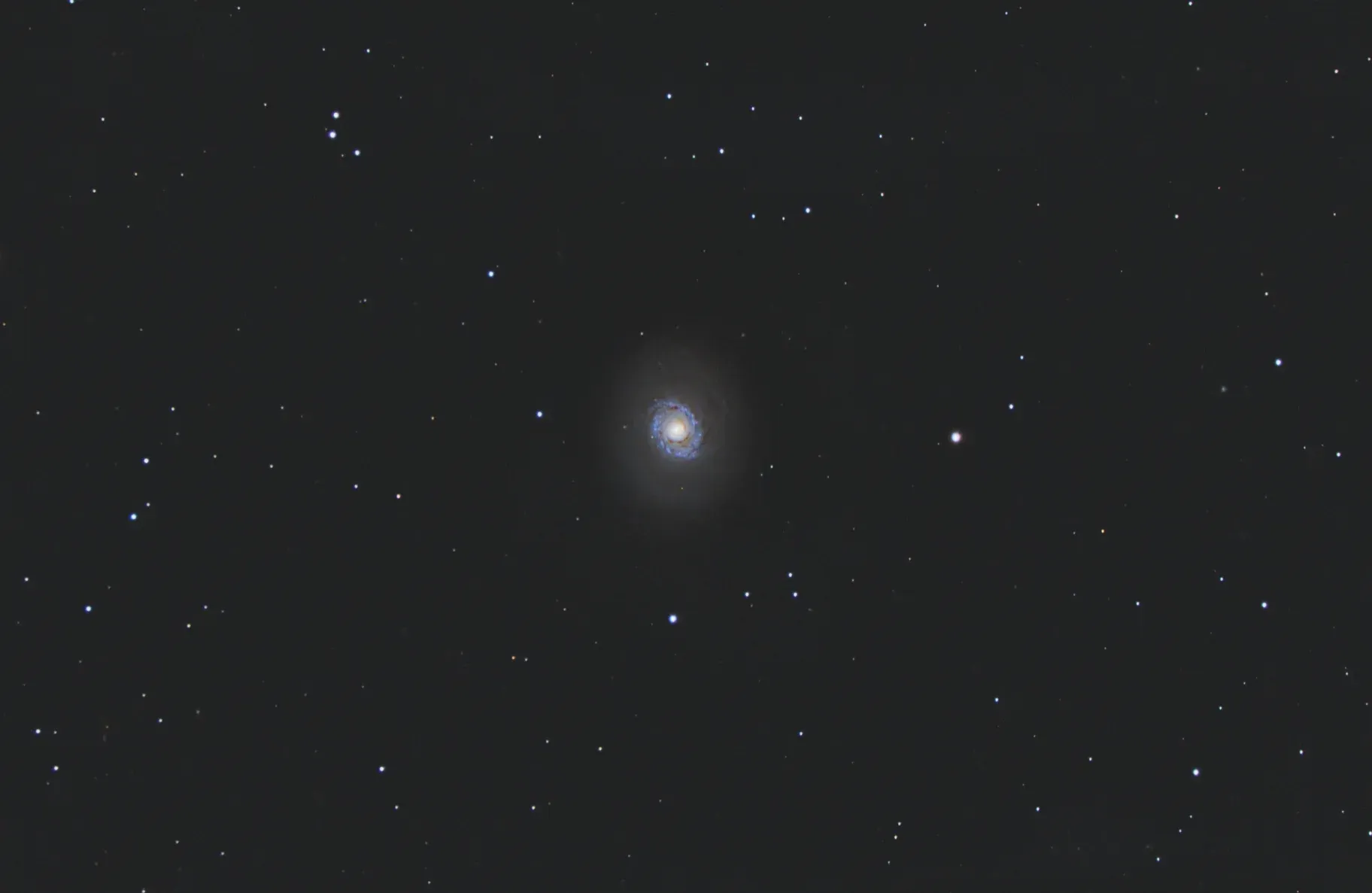 M94: Face on spiral galaxy