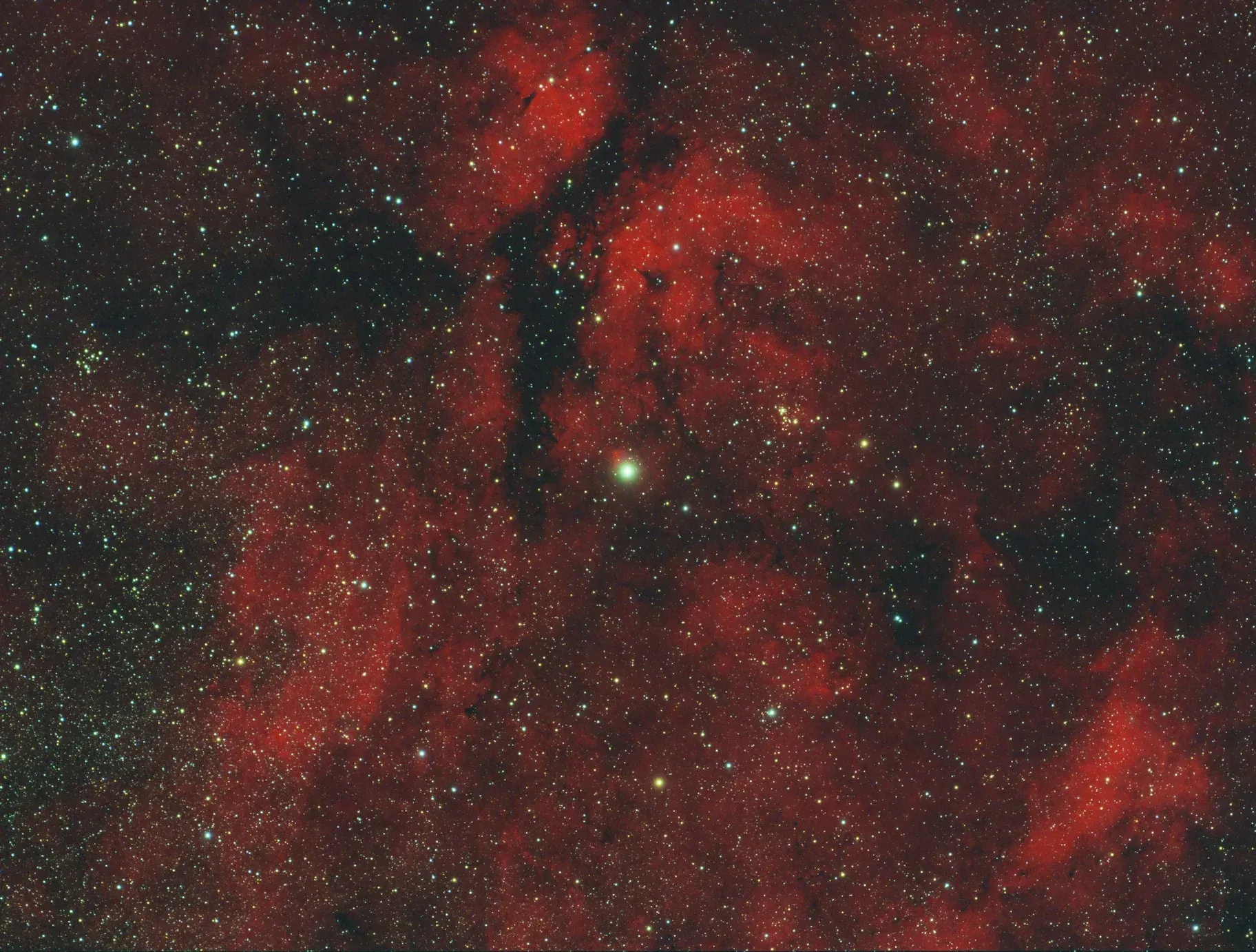 The SADR star region. That’s Sadr in the middle. I shot this as one hour of RGB on my ZWO ASI071MC-Pro camera, then managed to get a second night where I added 4 hours of Hydrogen Alpha data using the ZWO ASI1600MM-C camera. I then processed and combined the RGB data, and replaced the red channel with the HA data from the other camera. Then I cropped the final frame to the size of the smaller camera. 