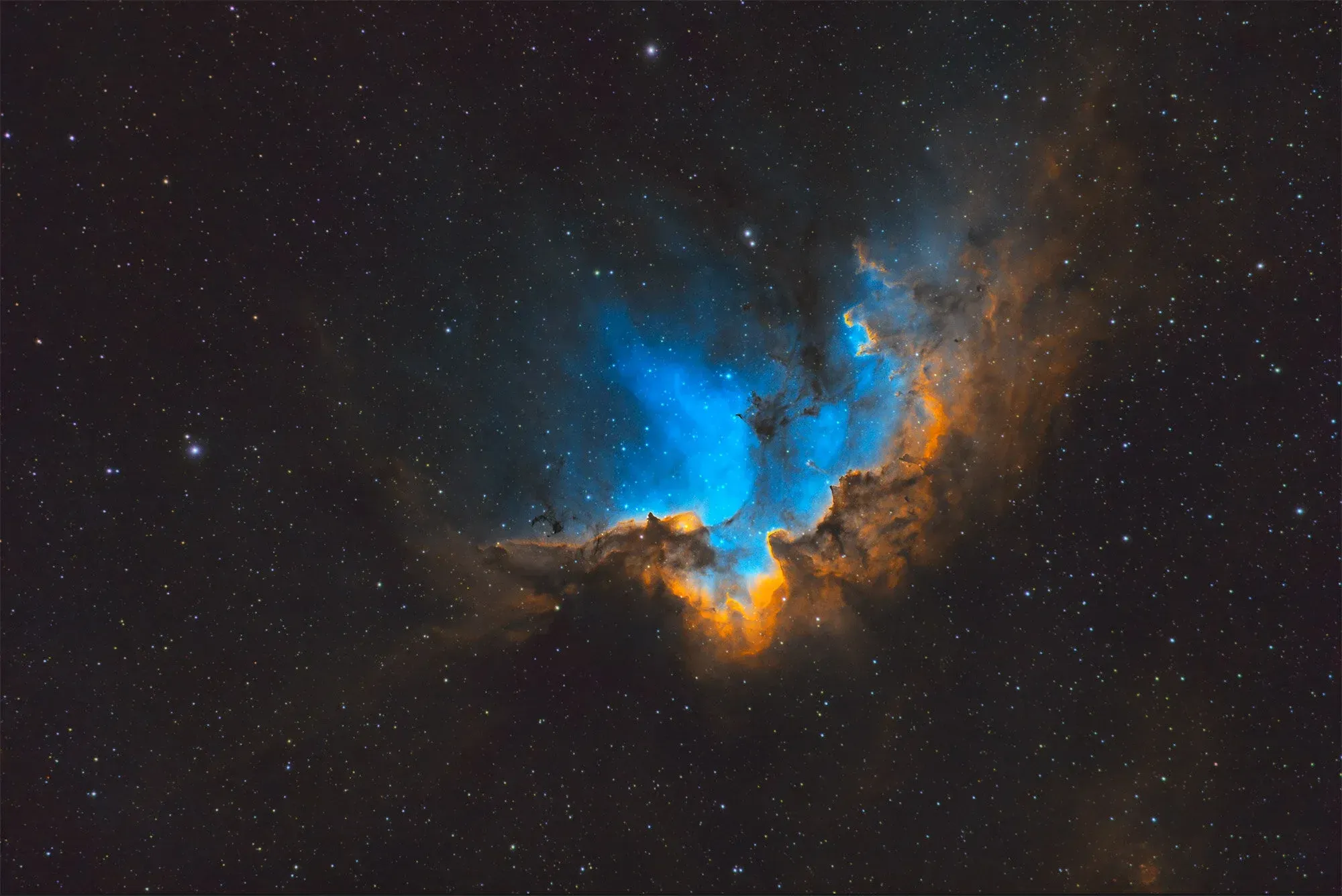  The final image of the Wizard Nebula using Topaz Denoise AI. 