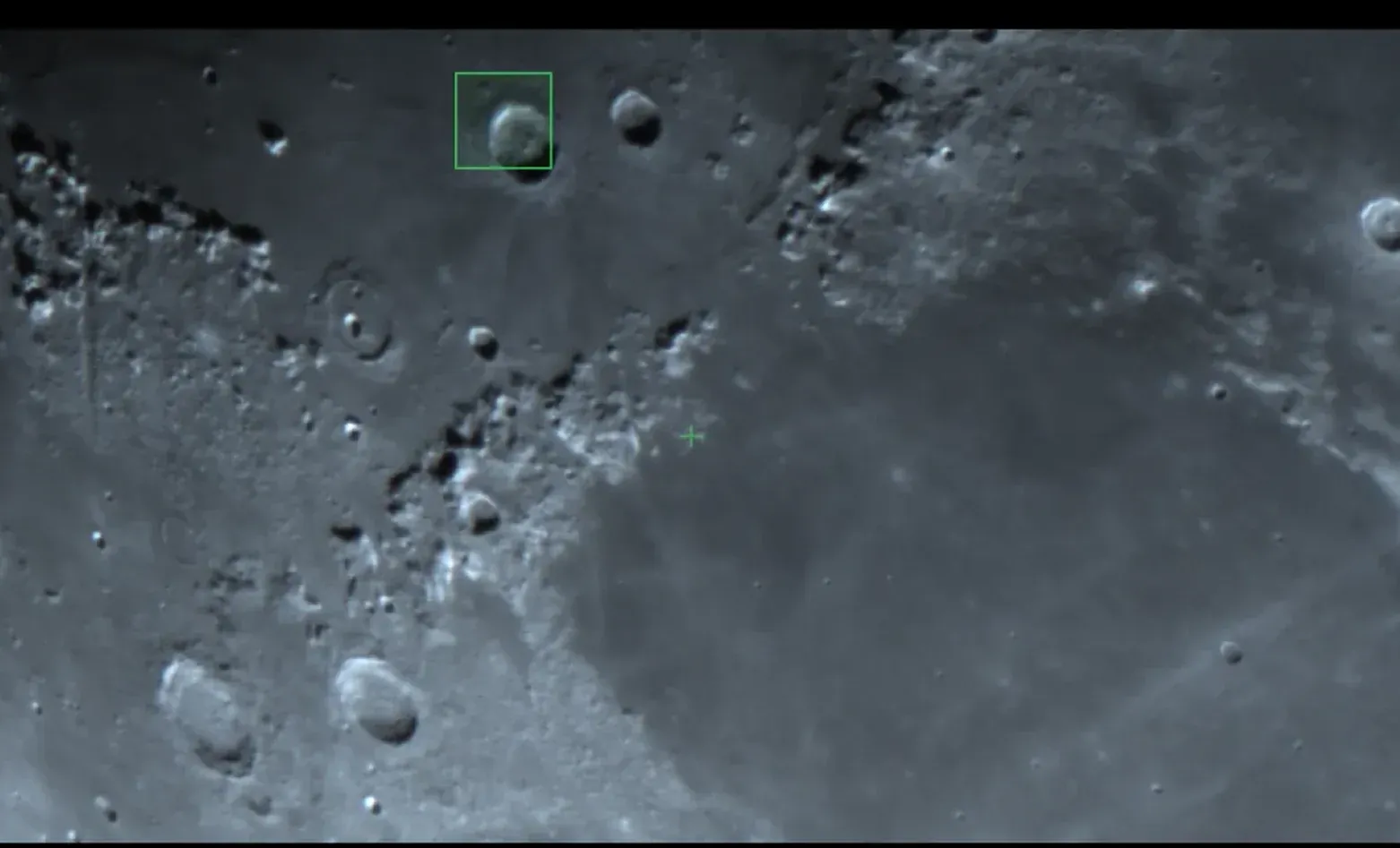 A lunar crater held in Laminar's surface tracking box