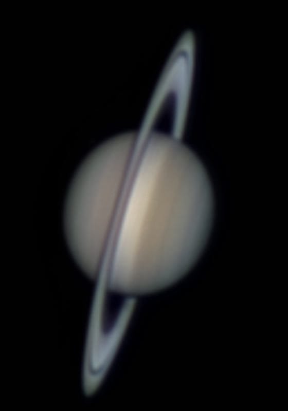 Saturn, step 4: Saturation. Saturation at 166%. Saturn's ochre belts and pale zones come through. The same rule applies here as in Sharpen: stop before the color looks painted on.
