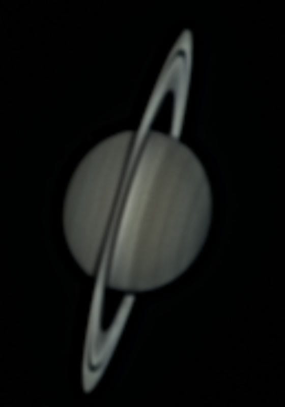 Saturn, too far: Layer 1 at 2.57, Layer 2 at 2.52. Crisper, and a dark halo now surrounds the globe and rings.