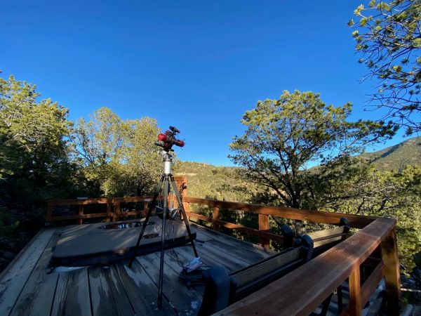 Remote astrophotography with a portable setup: traveling to a dark site