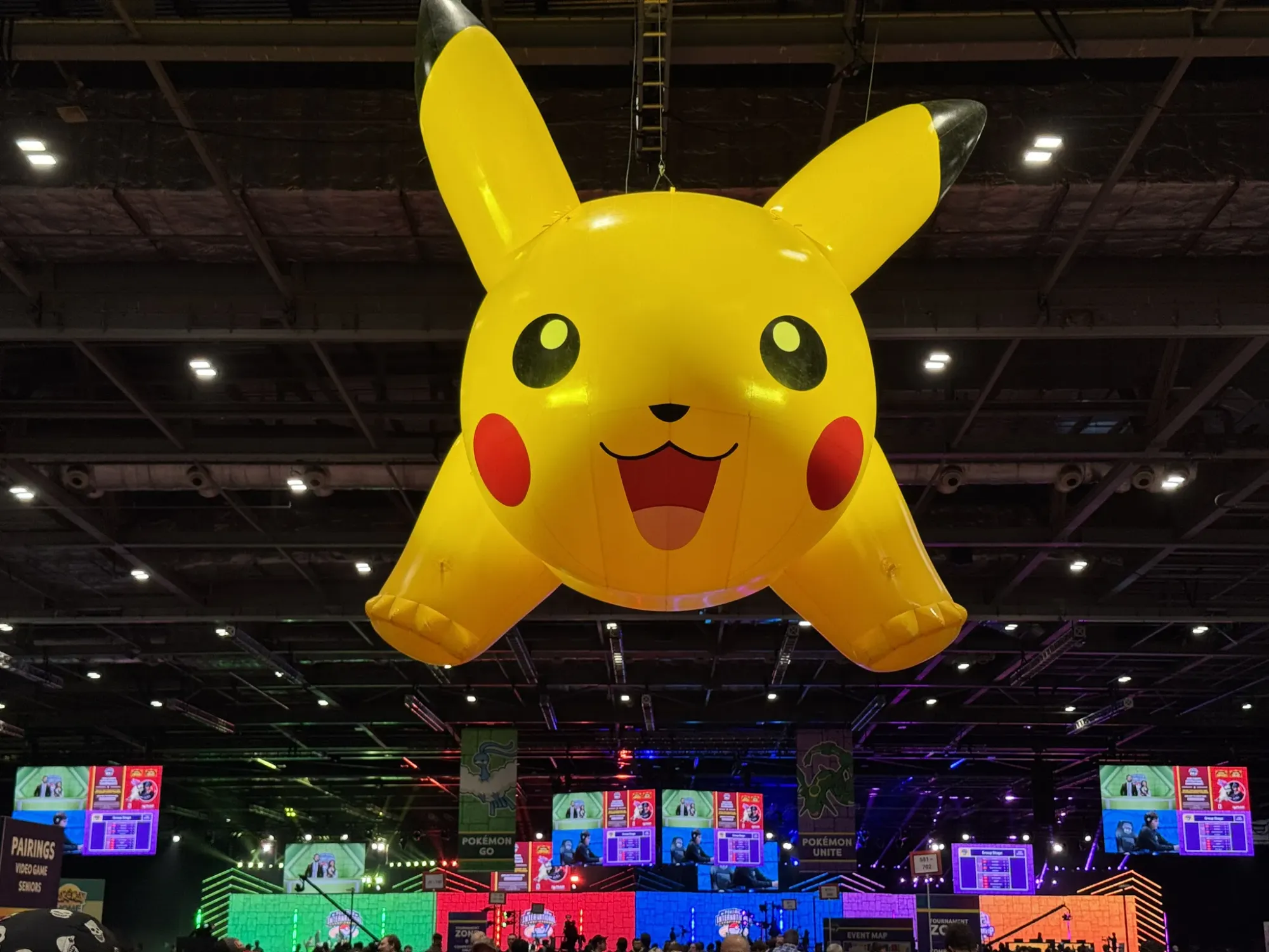 A giant inflatable Pikachu above the EUIC show floor.