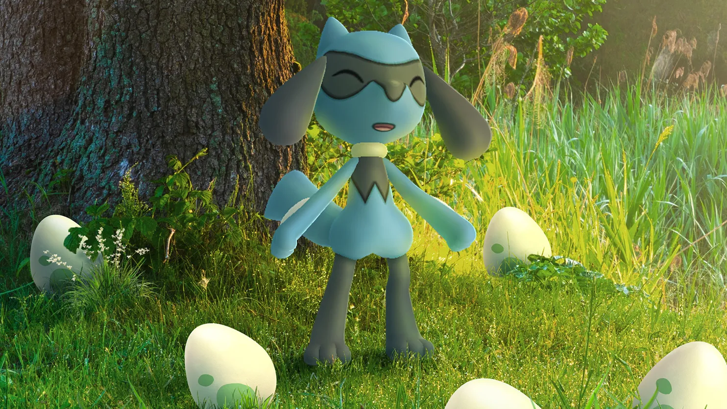 A smiling Riolu in tall grass surrounded by green 2km eggs.