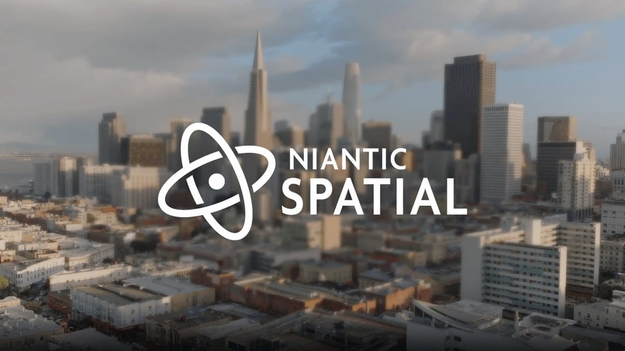 A logo for Niantic Spatial in front of a city.