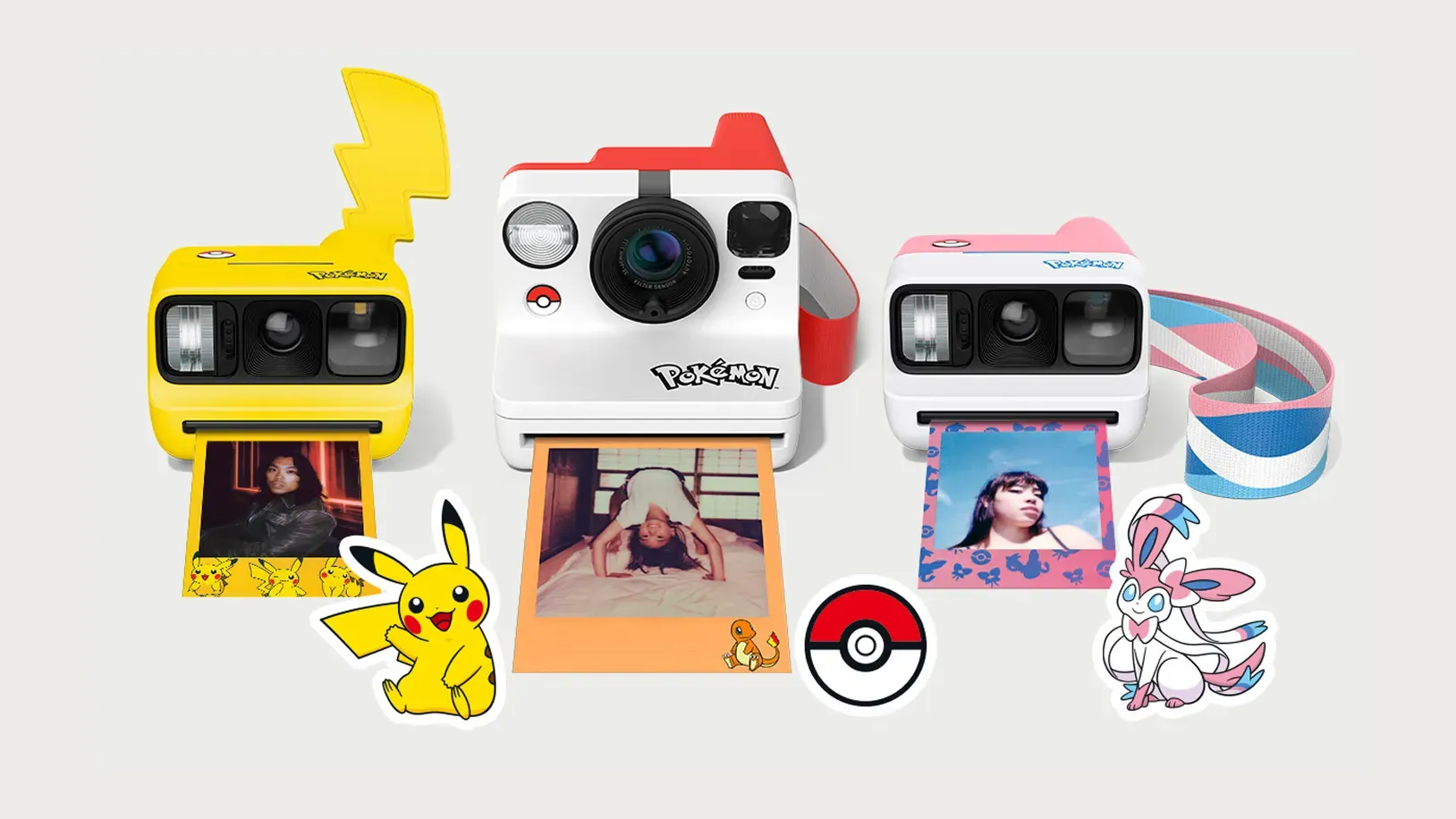Three Pokémon-themed Polaroid cameras against a white background.
