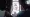 Trainers collectively battling in a Time Square-style setting in the first Pokémon Go trailer, with them looking up at Poké Balls on a building.