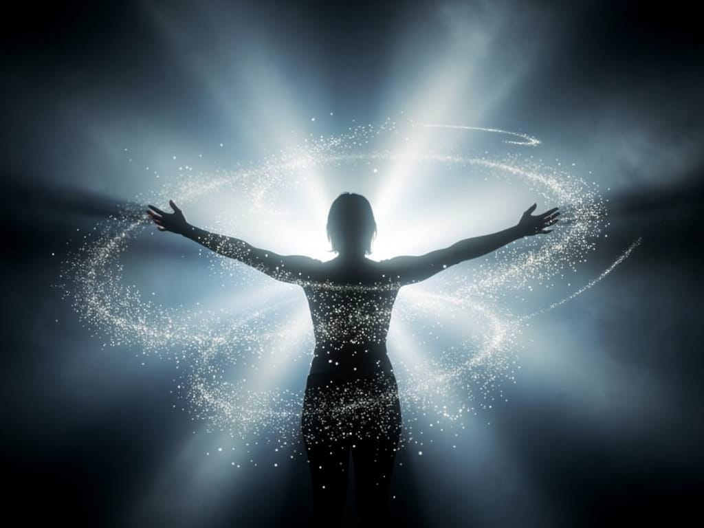 A person's silhouette surrounded by swirling light representing released tension
