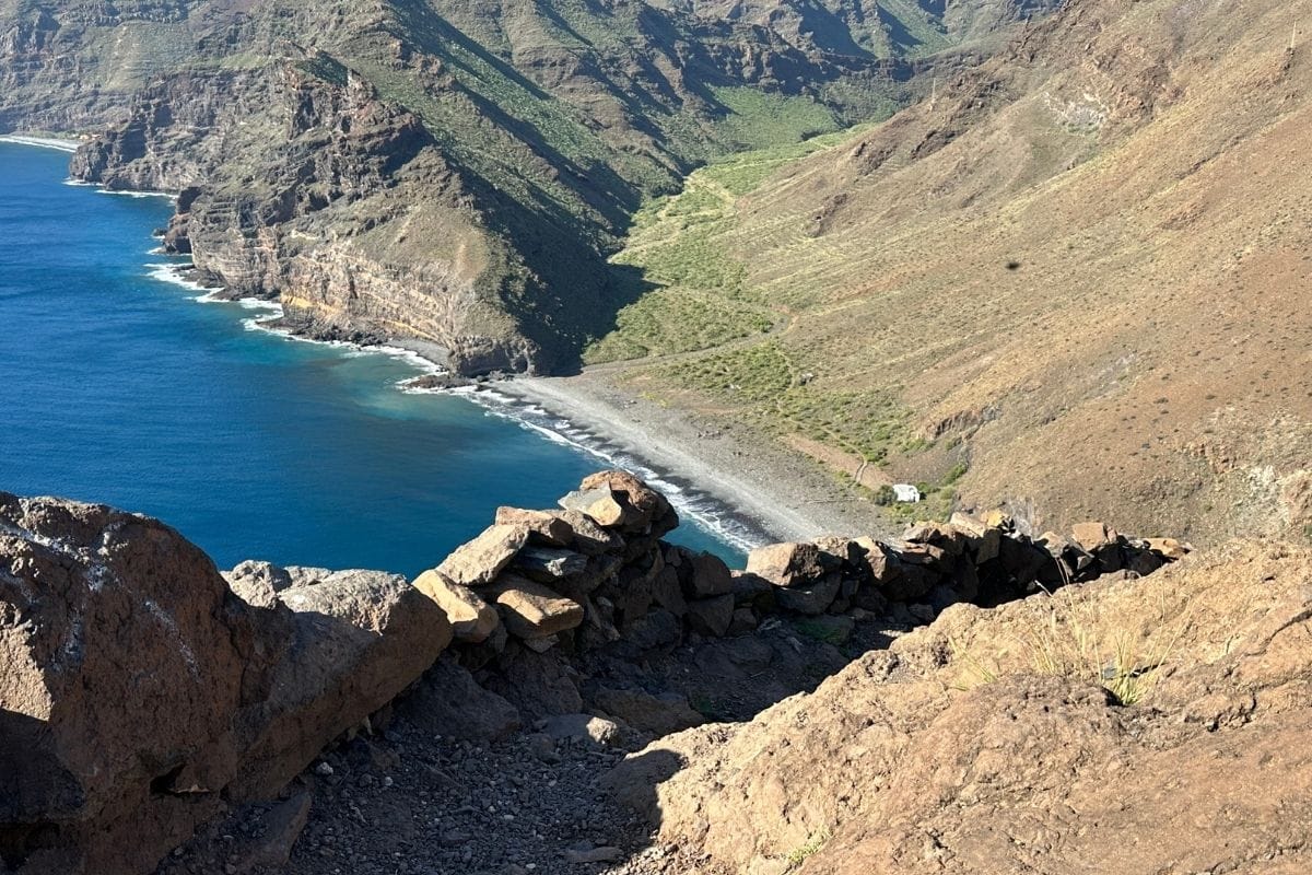 Beautiful View Of Black Pebble Beach And Blue Sea From Cliff Top Walk La Gomera Hiking To Playa De La Guancha From San Sebastian Canary Islands Spain