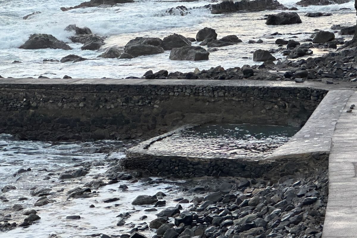 Saltwater Pool At Playa De Alojera La Gomera Also Known As Alojera Beach Canary Islands Spain With Dramatic Waves On Black Rocks