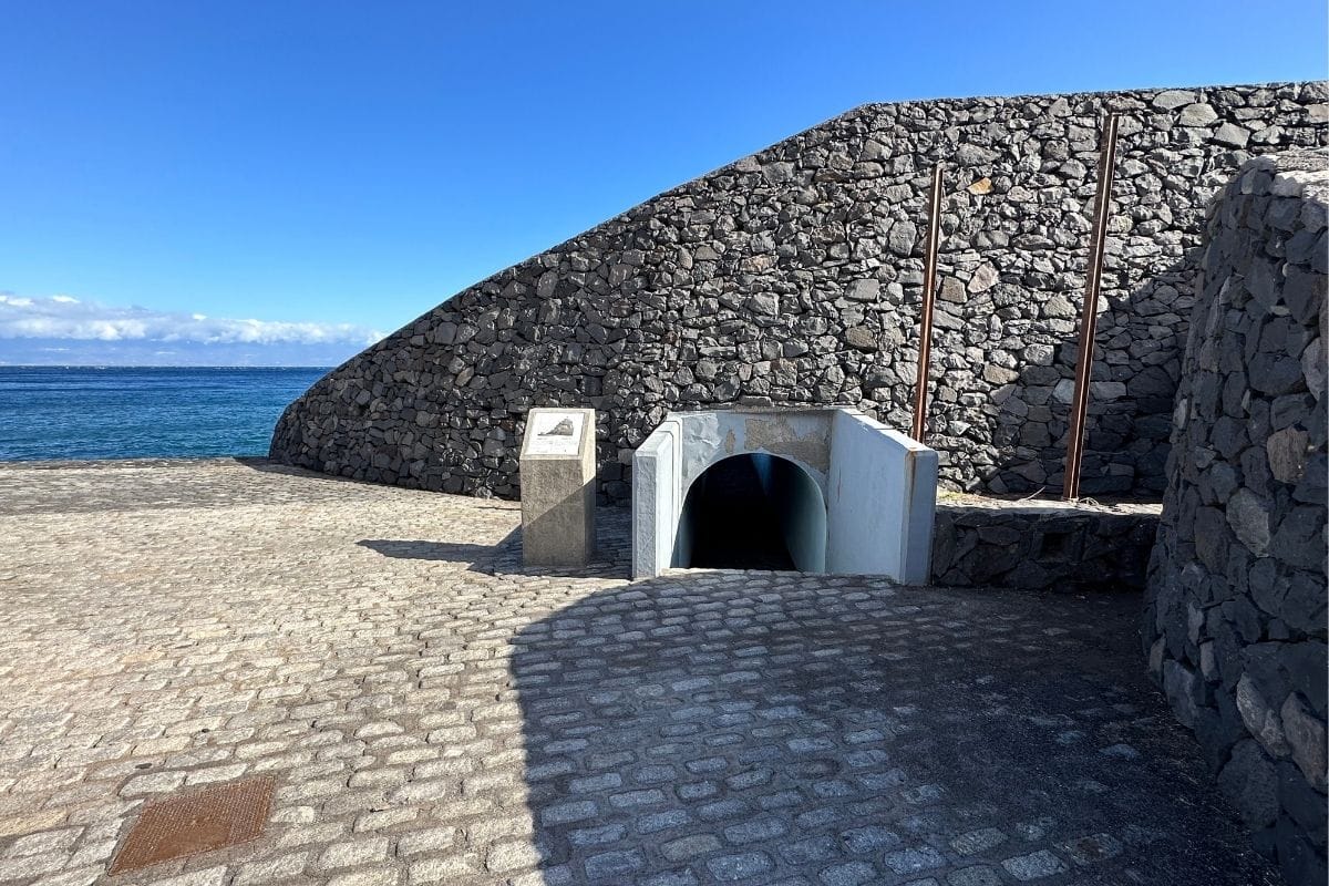 Playa De La Cueva La Gomera At San Sebastian Also Known As Cueva Beach Canary Islands Spain Access Tunnel To Olympic Monument In San Sebastian Also Known As Monumento de la Antorcha Olímpica México 1968