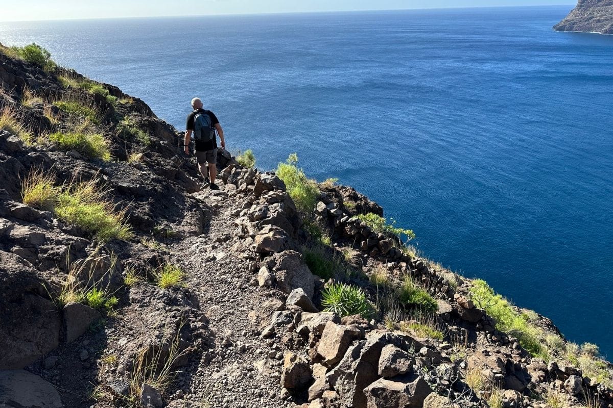 Cliff Top Walk Between San Sebastian And Playa Del Cabrito La Gomera Also Known As Cabrito Beach Canary Islands Spain View Across Blue Sea Blue Sky And Dramatic Cliffs