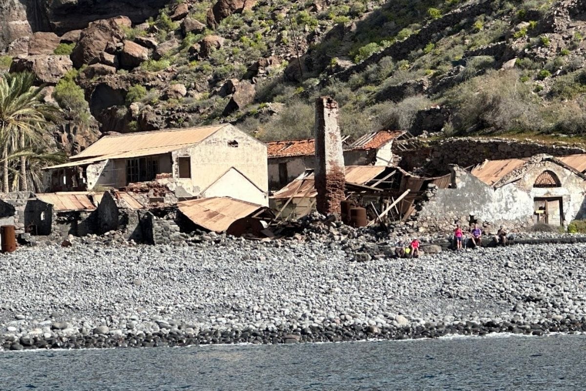 Deserted Buildings At Playa De La Cantera La Gomera Canary Islands Spain With Rocky Beach And Sea In Foreground