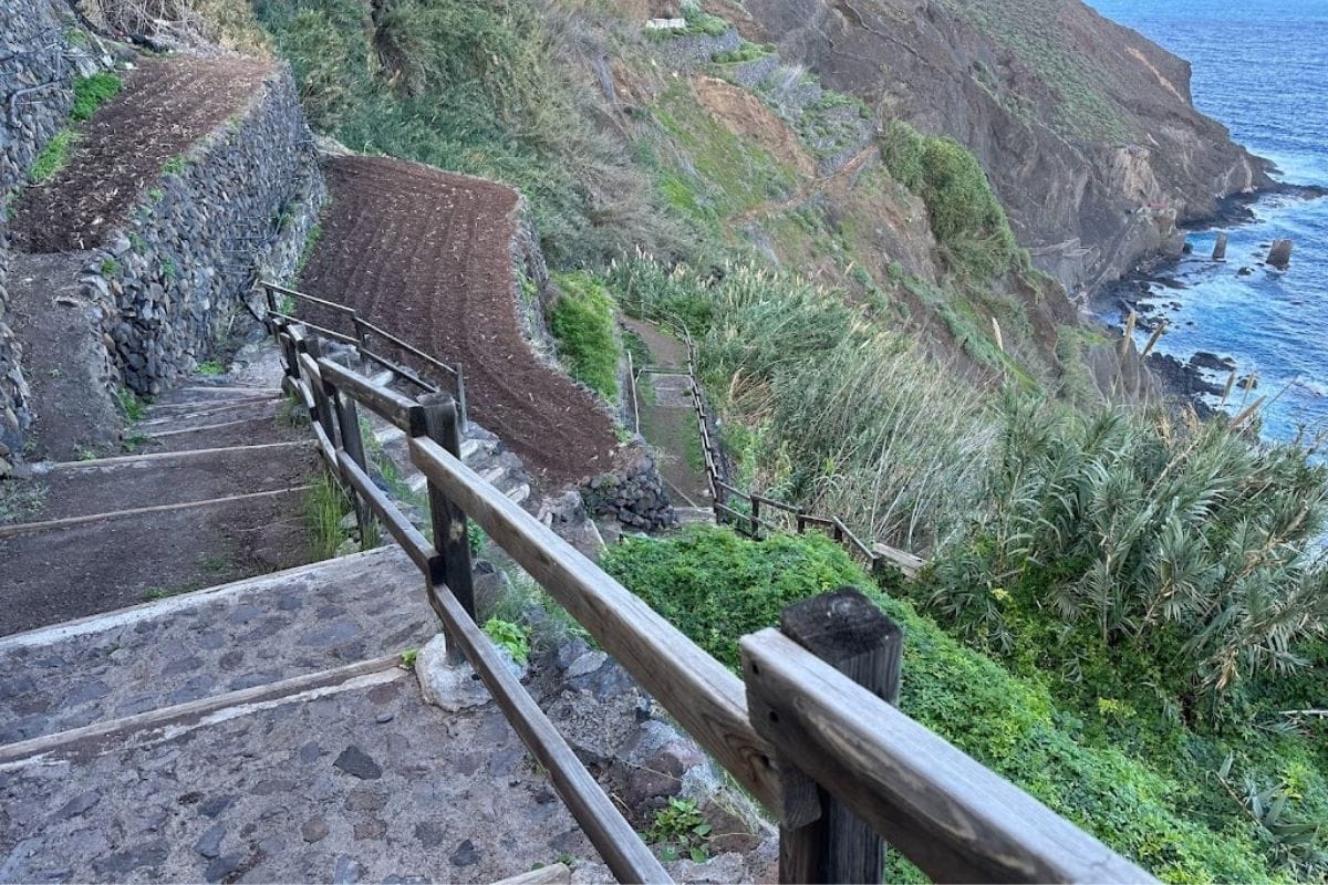 Hiking Trail Descends To Pescante De Agulo La Gomera Canary Islands Spain With Blue Sea And Dramatic Waves In The Background