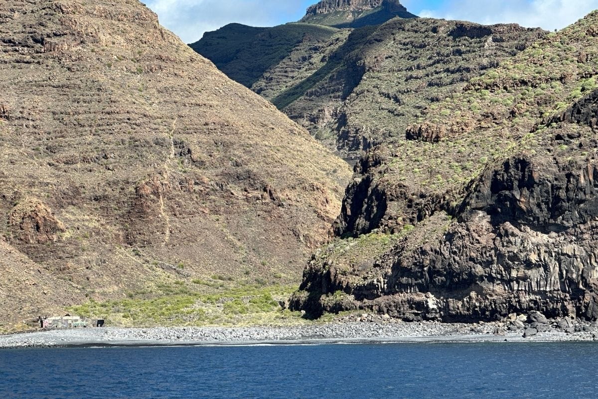 Blue Sea Lies In Front Of Playa De Iguala La Gomera Canary Islands Spain With Steep Mountains In The Background