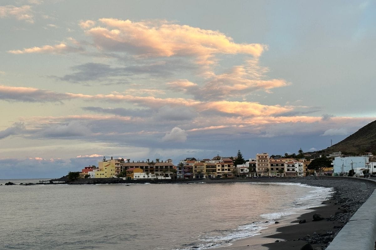 A Beach Of Sand And Pebble At Sunrise Called Playa De La Calera La Gomera Canary Islands Spain With Restaurants And Hotels In The Background