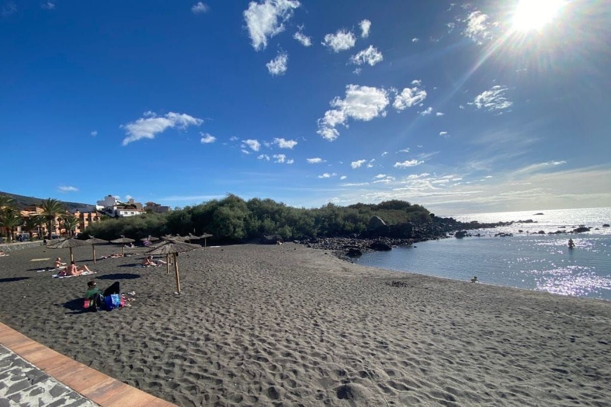 People Sit On The Beach And Swim At Charco Del Conde La Gomera At Valle Gran Rey Canary Islands Spain