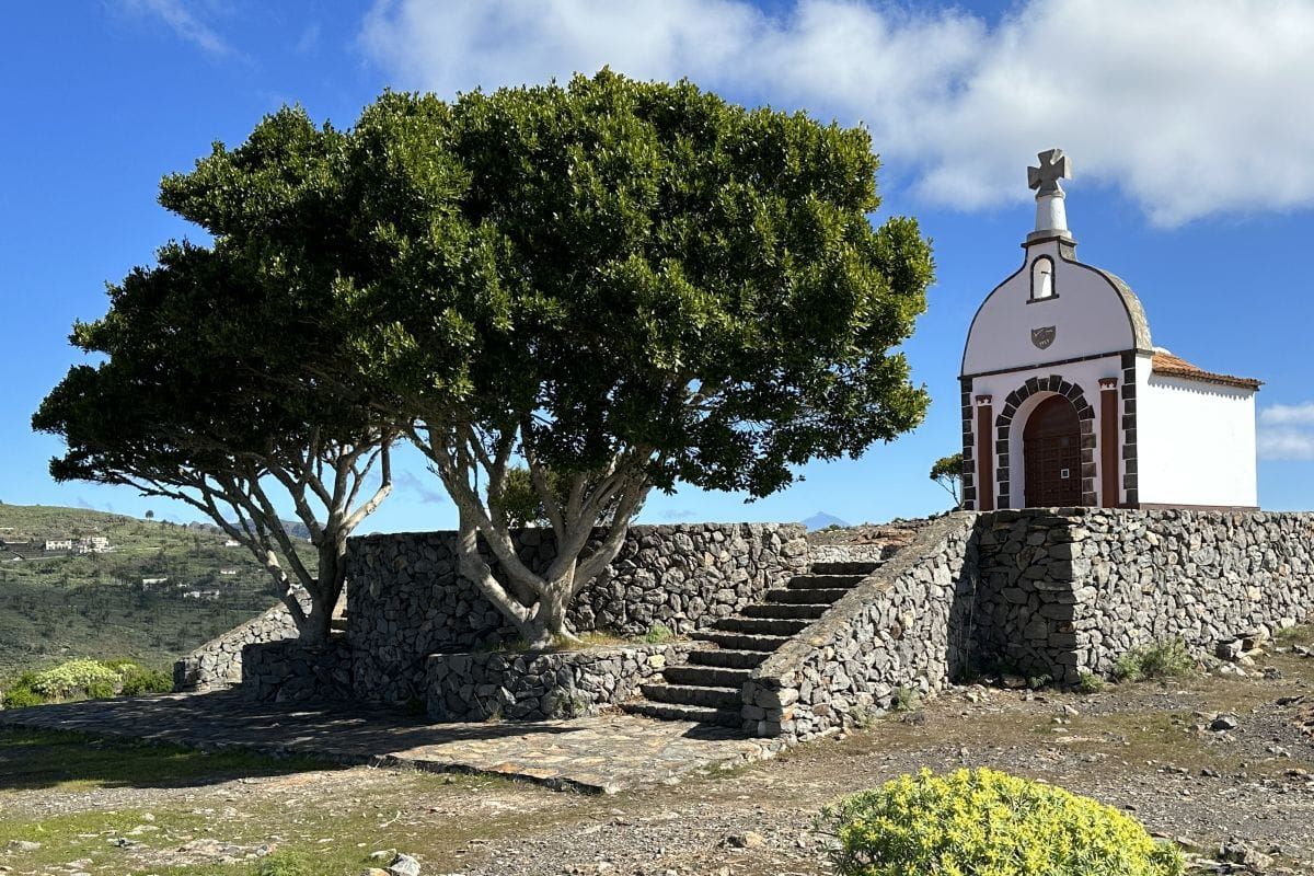 Beautiful Ermita De San Isidro La Gomera Canary Islands Spain Sits Above Stone Wall With Tree In Foreground