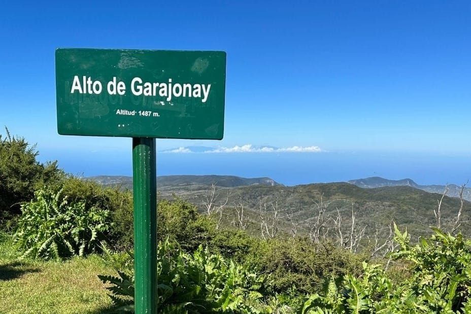 A Signpost Indicates The Summit On Beautiful Clear Day La Gomera Hiking To Alto De Garajonay From El Contadero Canary Islands