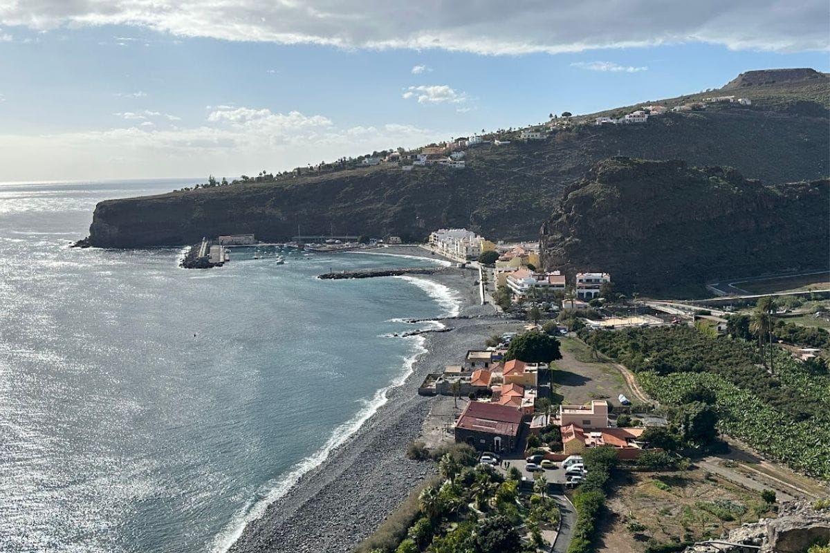 Aerial View Of Town And Beach Of Playa De Santiago La Gomera Canary Islands Spain Taken On Sunny Day With Blue Sky