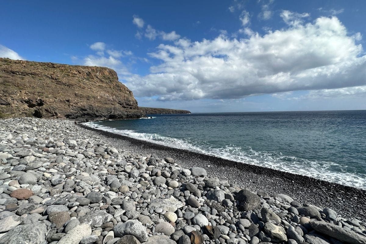 The Rocky Beach Of Playa De Tapahuga La Gomera Canary Islands Spain Taken On Sunny Day With Blue Sky And Blue Sea