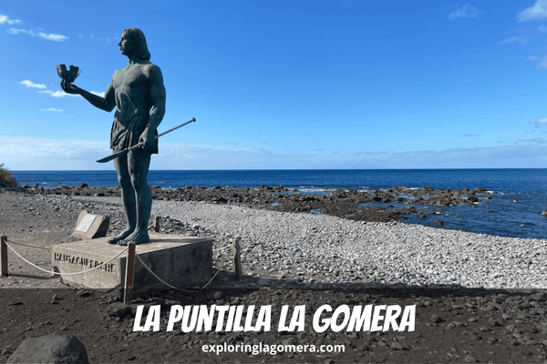 Bronze Statue Hautacuperche On A Beautiful Sunny Day Stands At The Edge Of La Puntilla La Gomera At Valle Gran Rey Town Canar