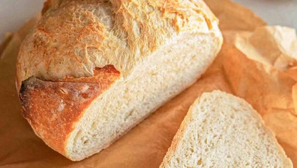 A simple loaf of bread on a kitchen table