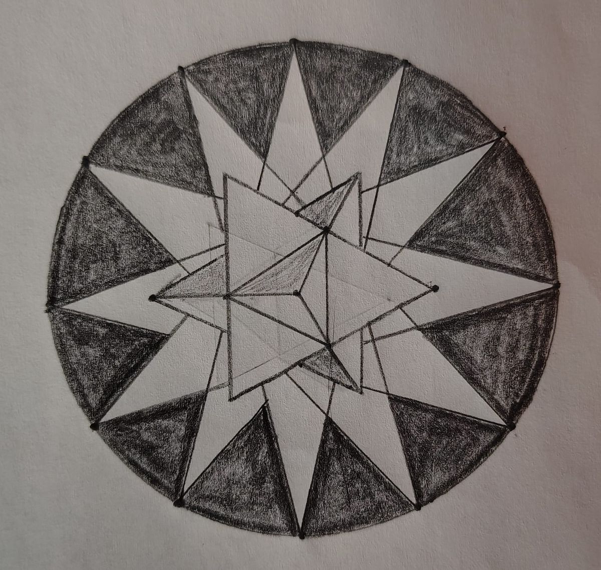 A stellated octahedron atop an inscribed dodecagram