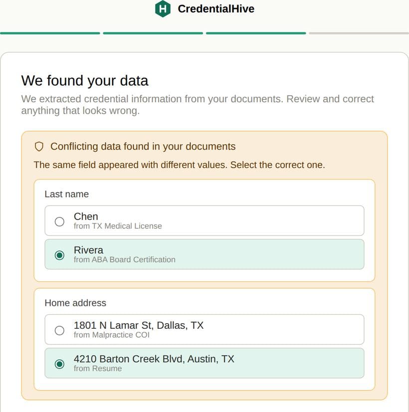 Reviewing extracted credential data and resolving conflicting values